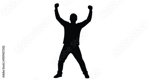 A victorious man raises his arms in joyful celebration silhouette