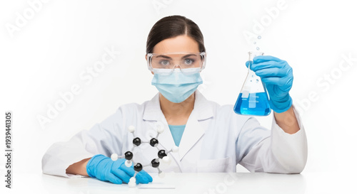 Female scientist in lab coat examining molecular structure with blue liquid flask