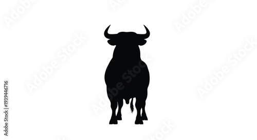 A striking black silhouette of a bull facing forward