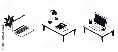 Home office laptops arranged with desk accessories on white background