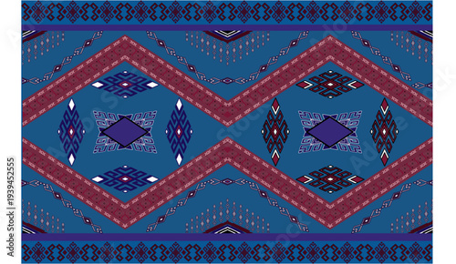 The fabric desing pattern features an indigo background with blue and red flowers bordered by dark pink