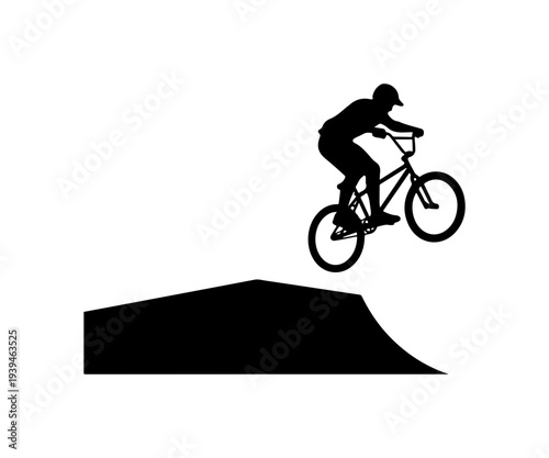 Vector silhouette of man riding bicycle off ramp