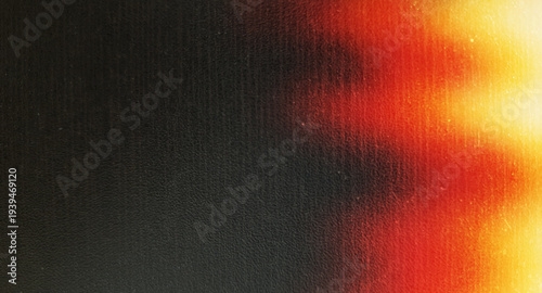 Abstract Red and Orange Light Leak on Black Textured Background with Retro Film Grain