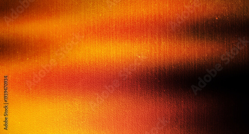 Abstract Orange and Gold Light Leak on Black Textured Background with Retro Film Grain and Vertical Lines