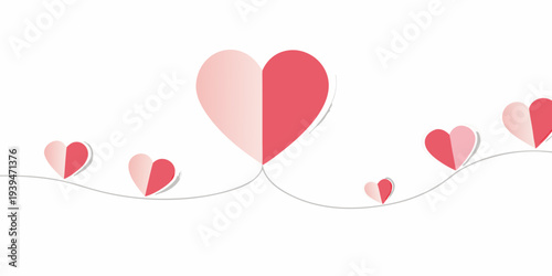 Paper hearts connected by a string on a white background