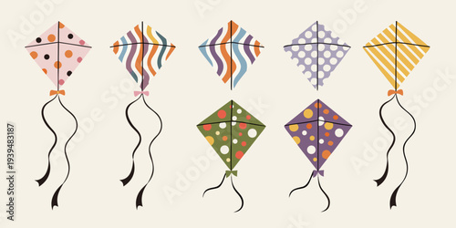 A collection of colorful patterned kites floating against a soft background