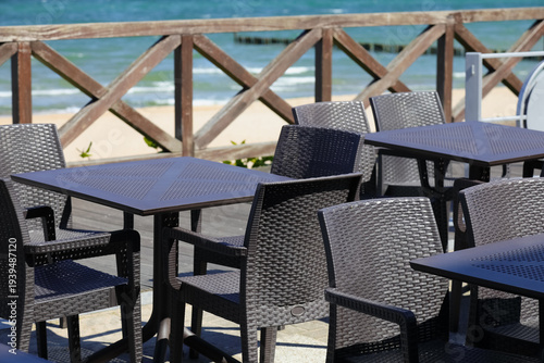 The outdoor restaurant, which is located right off the Baltic Sea beach, is currently empty and the seats are not taken