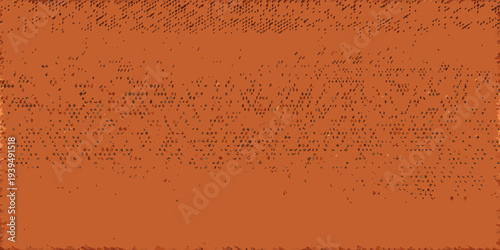 Abstract orange texture with scattered dark speckles and gradients