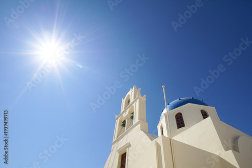 Bright sunlight on a church on the island of Santorin 