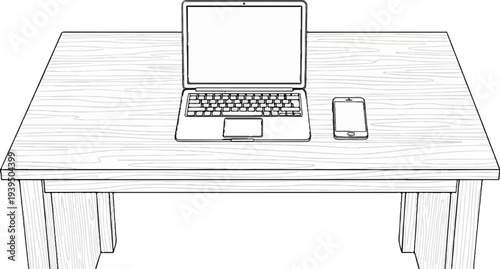 A wooden desk with a laptop and a mobile phone on its surface