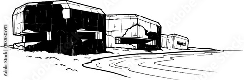 Concrete bunkers on sandy ground by the water's edge