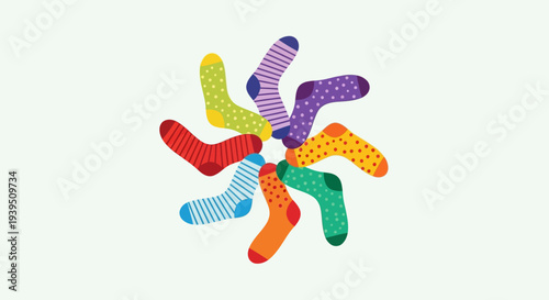 A vibrant, circular arrangement of colorful, patterned socks, resembling a pinwheel on a white background