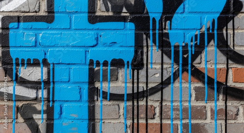 Close-up of Blue and Black Graffiti on Brick Wall.