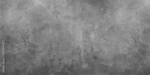 A dark and textured grunge concrete wall background featuring a rough black and white cement surface with an old vintage pattern.