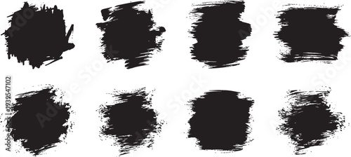 Collection of seven black brush stroke smudge elements on white background