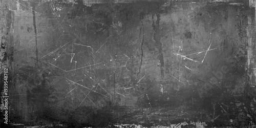 A dark grunge wall texture with black and white space background features a smoky fog pattern and stormy clouds. grungy look perfect for backgrounds or edgy design work.