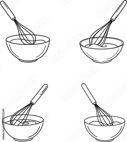 Four wire whisks in bowls for mixing ingredients