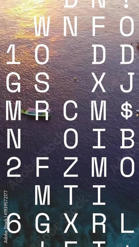 Vertical video: Green-yellow boat drifting over reef while cycling text grid masking scene for tech