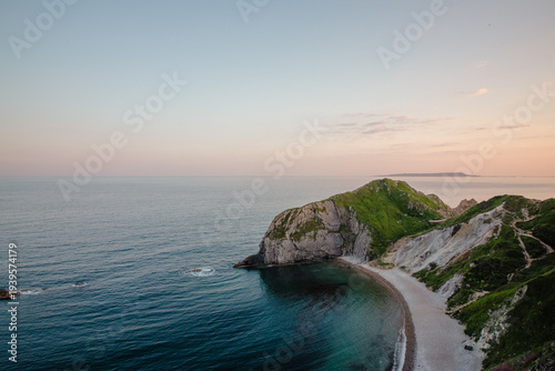 Dorset Coastline during sunset. Durdle Door, Dorset, UK