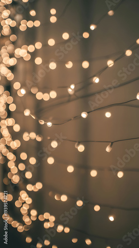 A string of warm glowing lights against a dark background