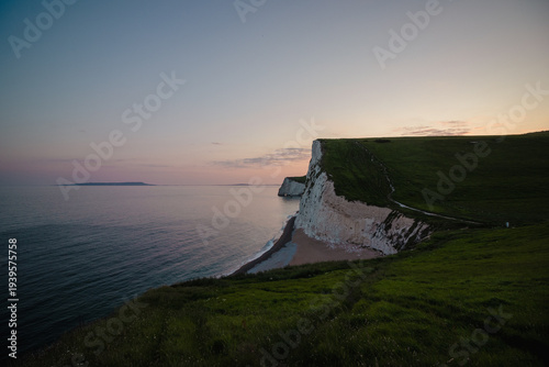 Dorset Coastline Cliff during sunset. Durdle Door, Dorset, UK