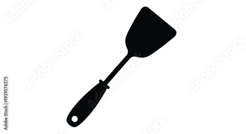 Black spatula against a white background a simple kitchen silhouette