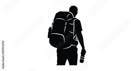Hiker with large backpack viewed from behind a striking silhouette