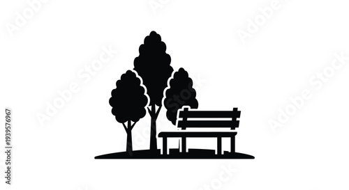 Park scene with trees and a bench depicted in stark silhouette