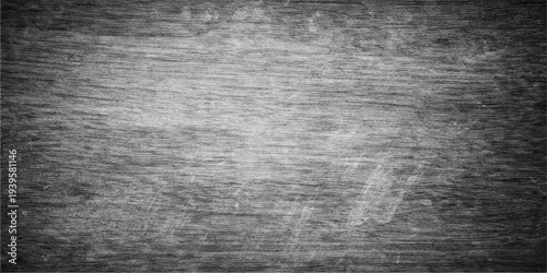 A dark aged grunge paper texture with a weathered black concrete pattern and a rough vintage stone surface backdrop for a dirty grey material design