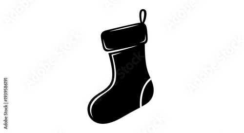 Black christmas stocking icon with white outline hanging on loop against plain white background for holiday decoration