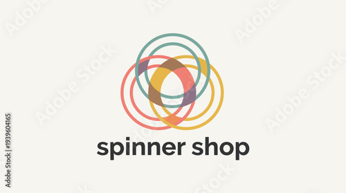 The striking logo design combines overlapping circles and a simple typeface, perfectly representing a modern and playful brand identity for a shop specializing in spinners.