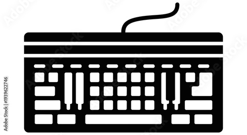 Modern computer keyboard with a wired connection on a white background for typing and computing purposes efficiently