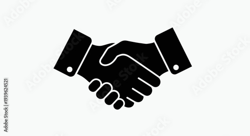 Close-up of Two Black Silhouetted Hands Shaking Firmly in Agreement on a White Background des