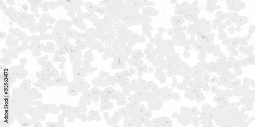 Abstract grayscale background with scattered irregular shapes and textures