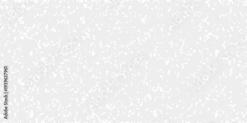 Abstract grainy texture with subtle variations in white and gray tones