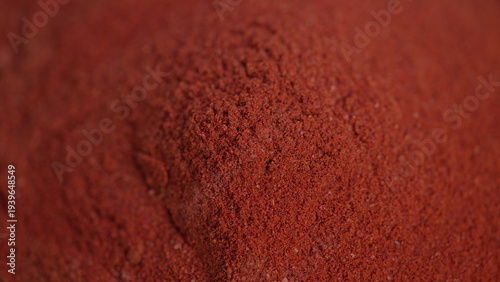 Billede på lærred Spicy seasoning display, Closeup of vibrant paprika, Detailed shot of textured r