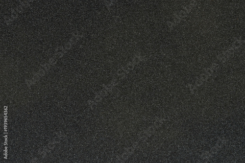 Photos Black sandpaper texture with rough surface showing fine grain details clearly