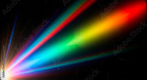 Rainbow Spectrum Light Rays Bursting from a Point on a Dark Textured Background image photo