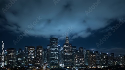 Wallpaper Mural Dramatic nighttime cityscape view with illuminated skyscrapers and dark cloudy sky Torontodigital.ca