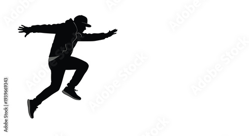 Dynamic black silhouette vector illustration of a young man wearing a cap making a powerful forward leap