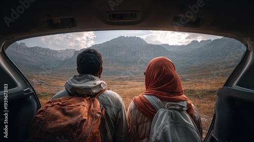 Muslim Couple Looking at Mountain Landscape from Car