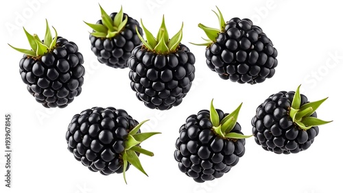 Fresh blackberries scattered on white background, top view of ripe juicy fruit, healthy snack