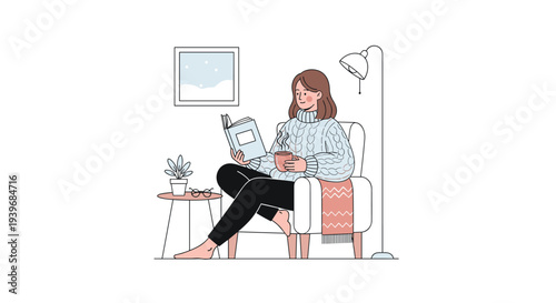 A relaxed woman in a cable-knit sweater reads a book and sips from a mug while sitting in a white armchair beside a side table with a plant and glasses.