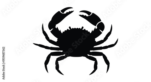 Black crab with prominent claws depicted in a striking silhouette