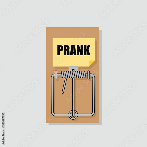 Mouse trap with a 'prank' note on the bait plate, signifying a setup for april fools' day humor and trickery