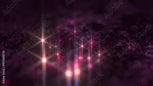 Purple shimmering glitter texture with glowing pink stars and twinkling bokeh light particles motion