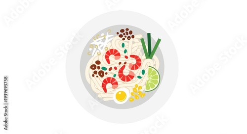 Delicious bowl of noodle soup with shrimp and garnishes.