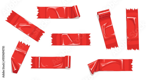 Multiple shiny red adhesive tape pieces, some crumpled and some flat, are scattered across a clean white background.