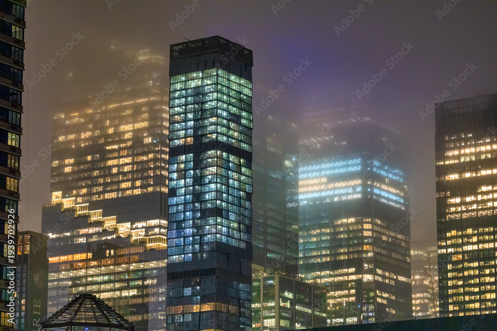 Fototapeta premium Manhattan streets bustling with life and lights at night New York City NYC