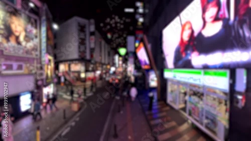 SHINJUKU, TOKYO, JAPAN - FEB 2026 : Blurred aerial view of Kabukicho area. Biggest entertainment, red light district in Japan. Japanese urban city nightlife concept video.